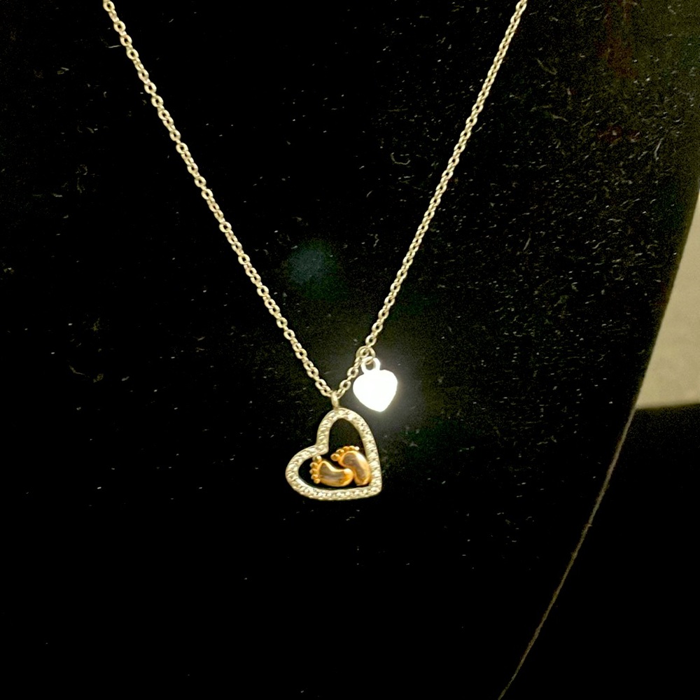 Preloved sterling silver heart with baby foot necklace